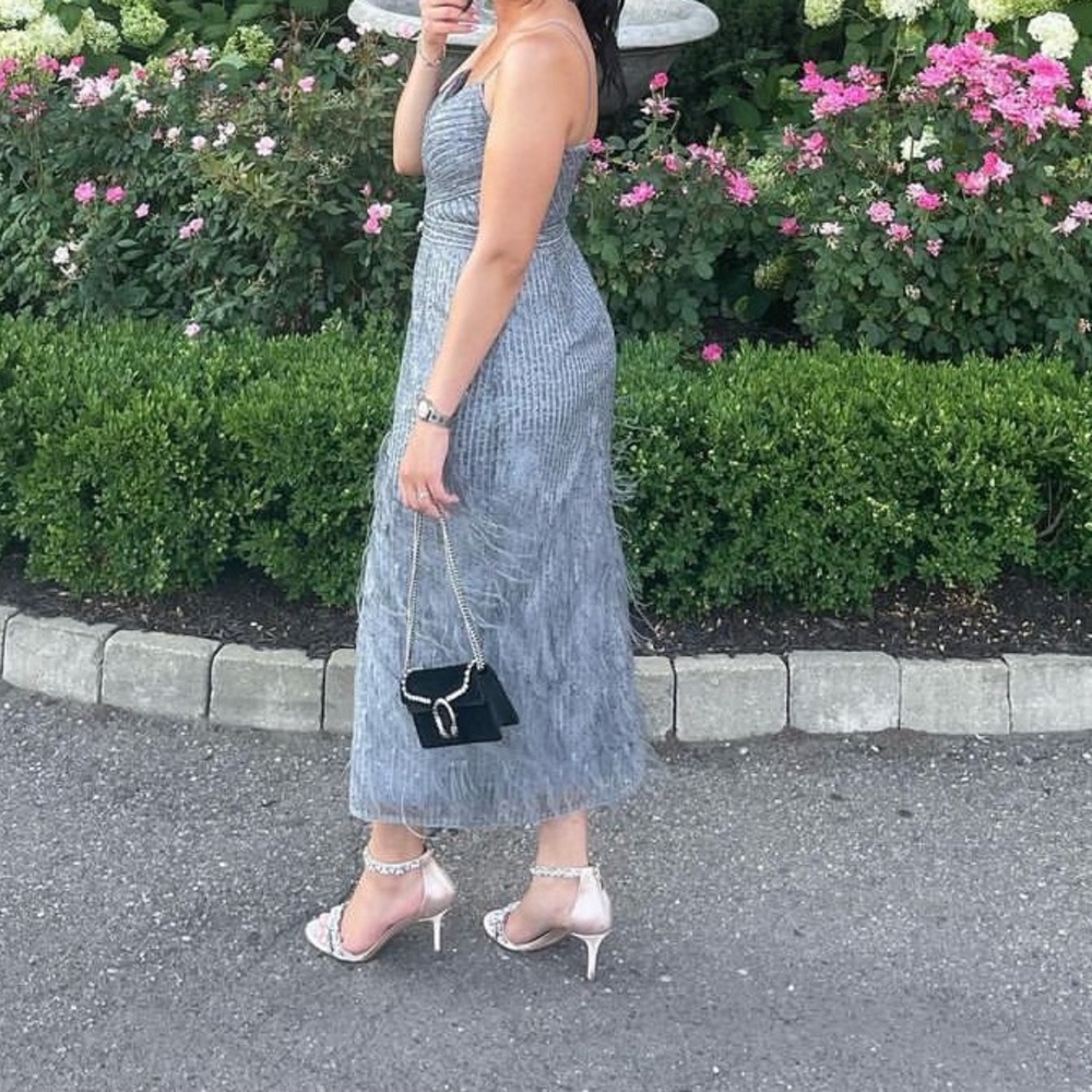 Formal gown worn twice to events for a few hours